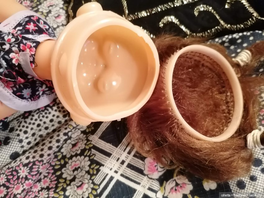 вскрытая голова пластмассовой куклы Оли Кругозор