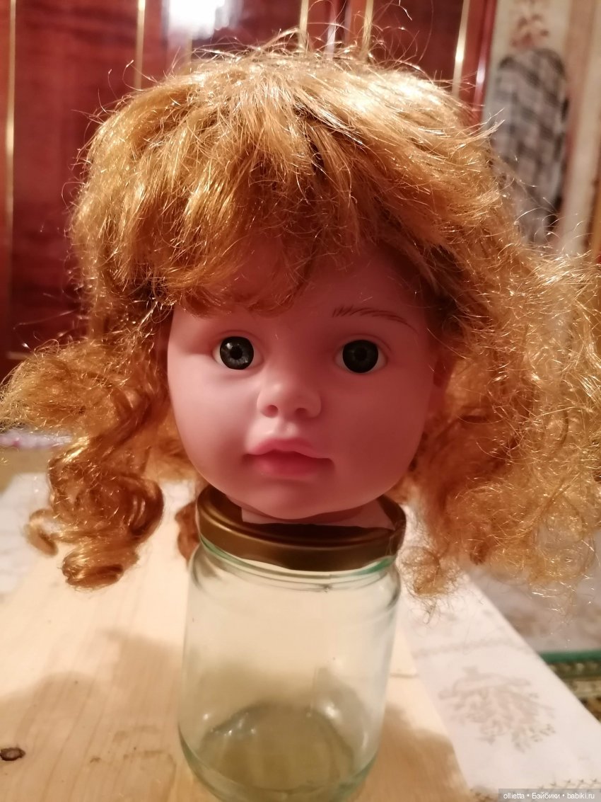 Голова китайской куклы перед укладкой прически