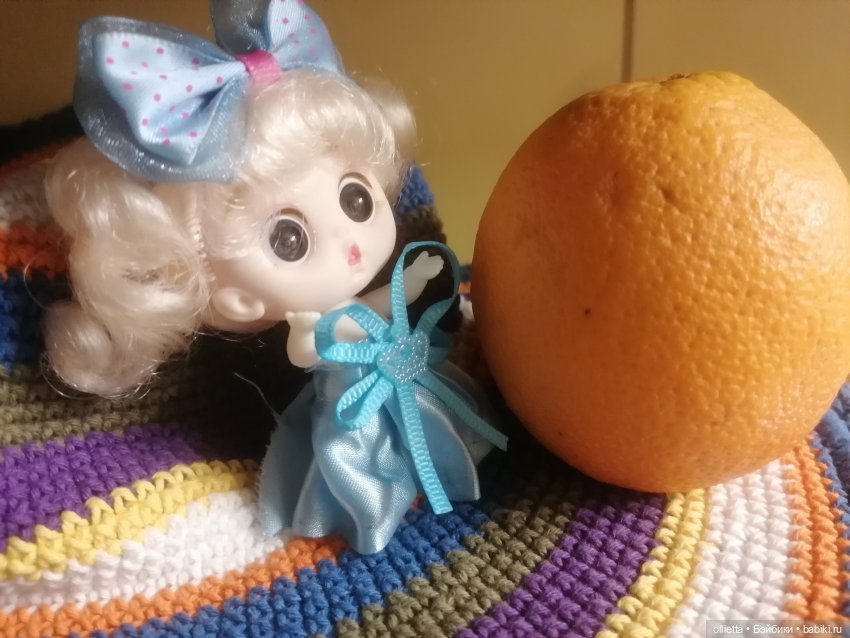 кукла с апельсином