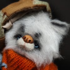 Котик рыбак