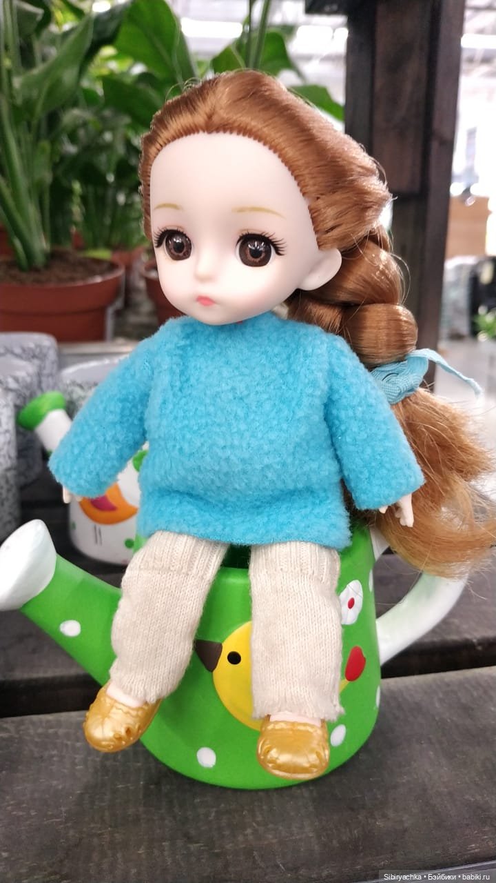 Глаша изучает садовые фигуры (фото 2)