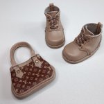 Ботинки и сумочка "Луи Виттон" для Паола Рейна