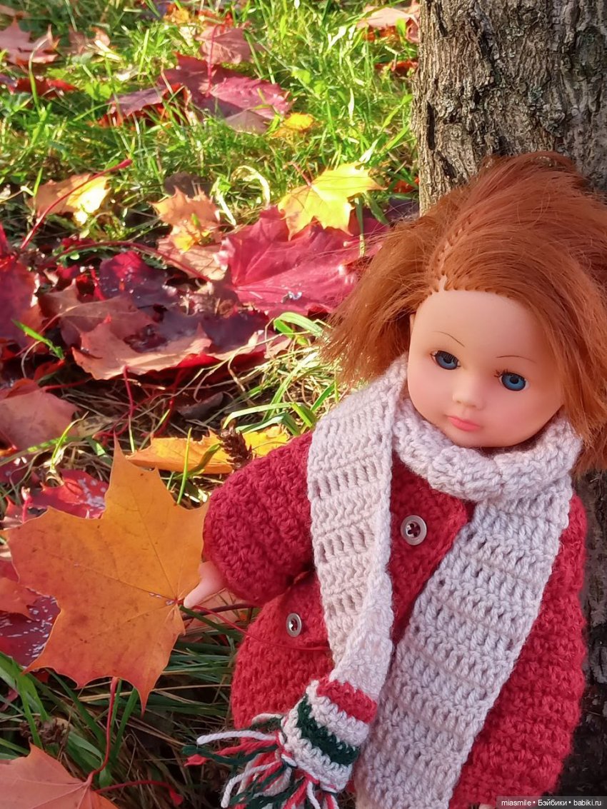 Рита с листочком клена