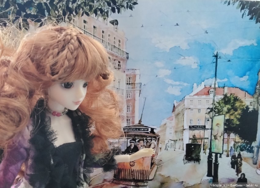 Джей долл Руа Гаррет и акварель "Трамвай на площади Двух церквей" Ванессы д'Азеведу.