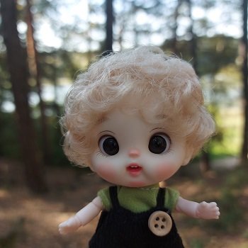 Забавная куколка