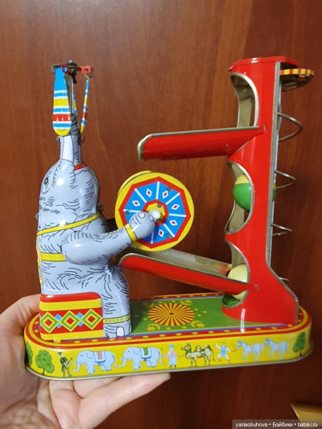 Винтажная заводная игрушка слон