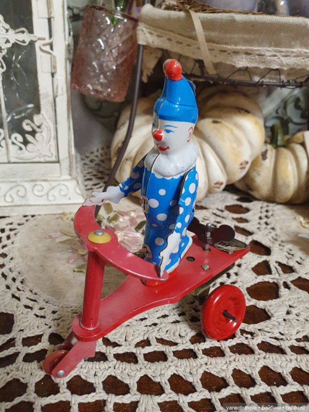 Винтажный заводной клоун на самокате. Репро (фото 6)