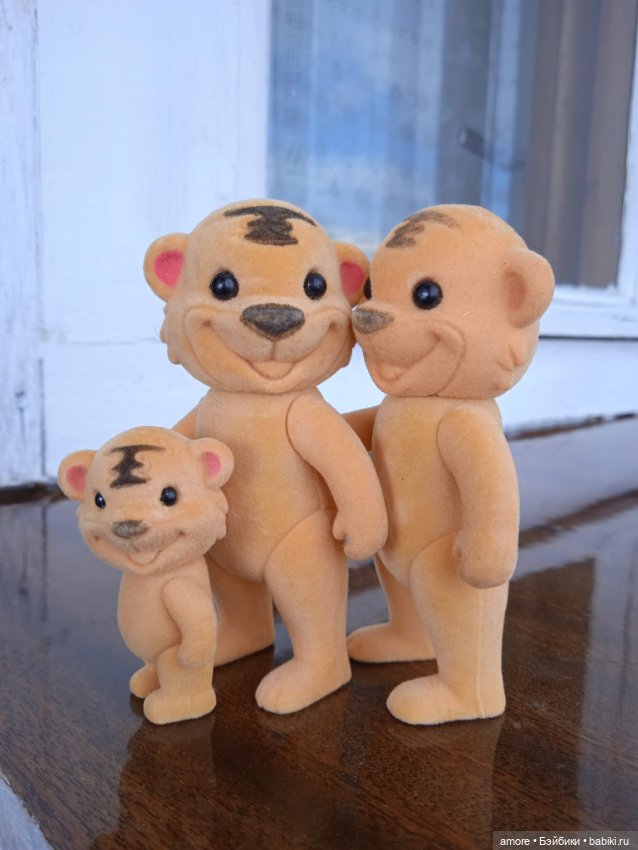 Миниатюрная семейка тигров (фото 3)