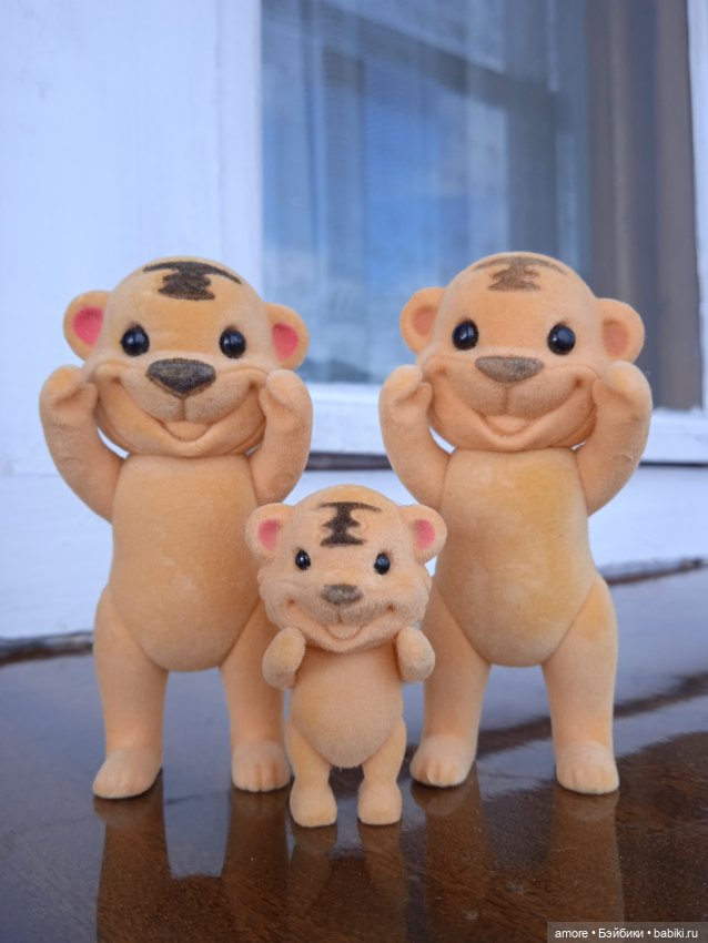 Миниатюрная семейка тигров (фото 4)