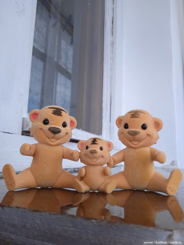 Миниатюрная семейка тигров (фото 5)