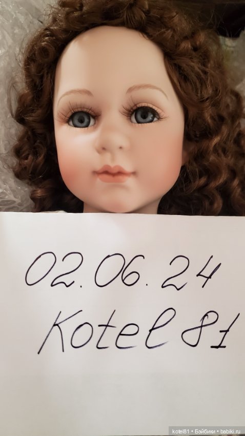 Кукла фарфоровая коллекционная (фото 6)