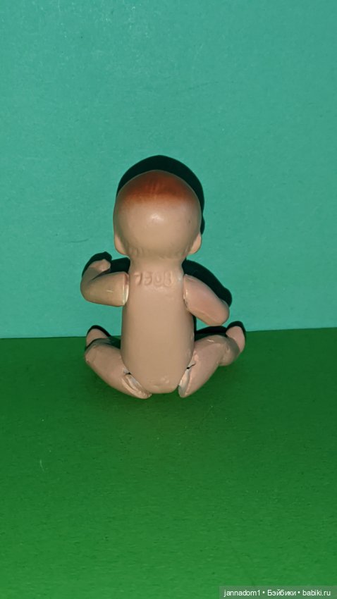 Керамический голыш рыжик Hertwig 1508 с рельефными волосами, высота 8 см (фото 3)