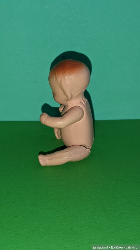 Керамический голыш рыжик Hertwig 1508 с рельефными волосами, высота 8 см (фото 2)