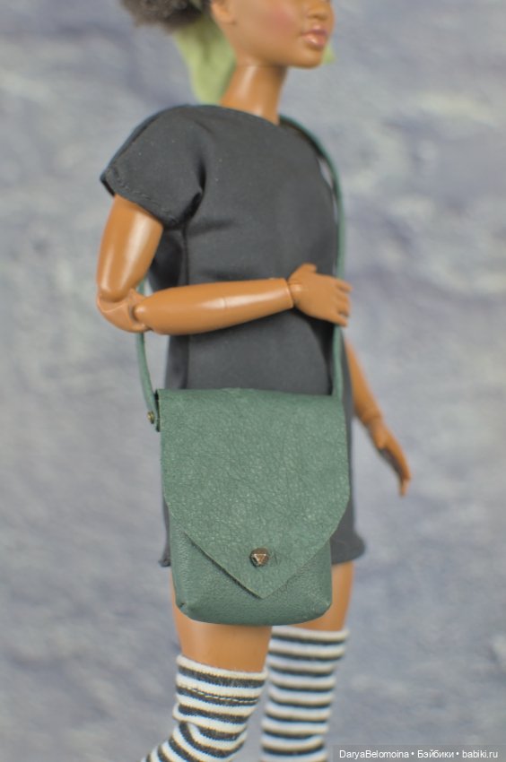 Темно-зеленая сумочка из тонкой кожи (фото 2)