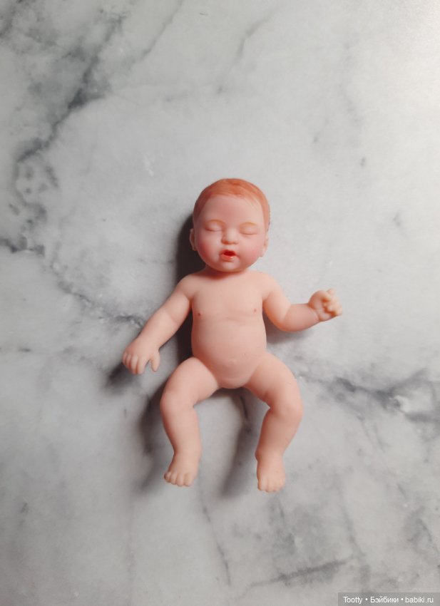 Рыжий малыш на весах. Zuru 2