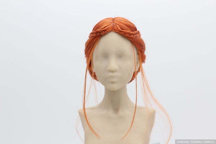 Пучок с красивым плетением на ОГ 11.7