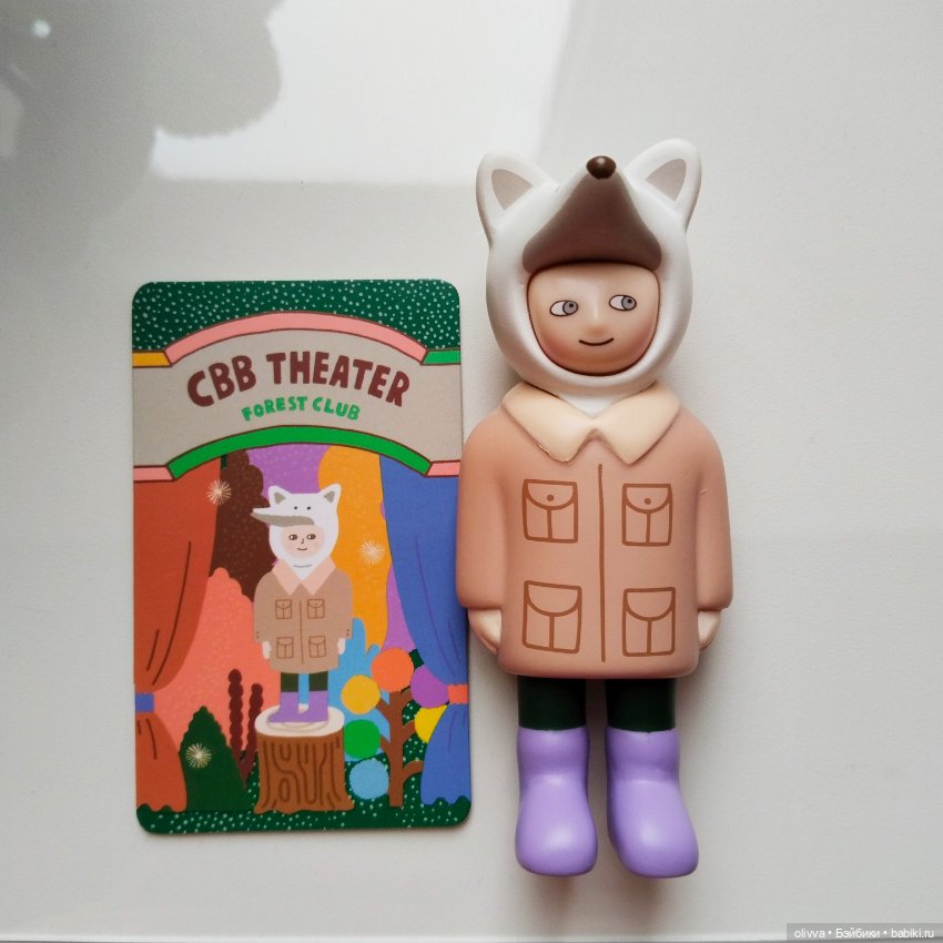 Фигурка малыша с фирменной карточкой