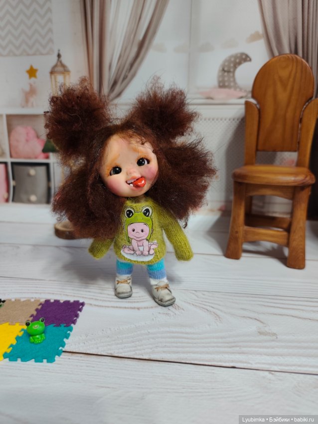 Очаровательный ребёнок-лягушонок