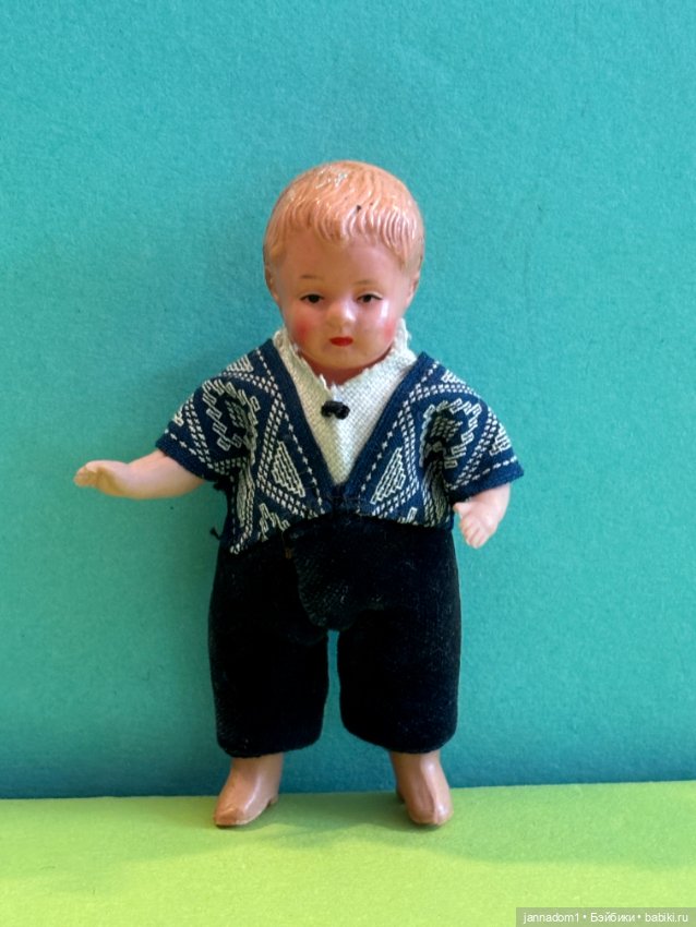 Очень редкая целлулоидная куколка Juno с рельефными волосами, высота 8,5 см (фото 9)