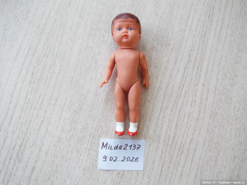 Голубоглазая малышка с зубками (фото 4)