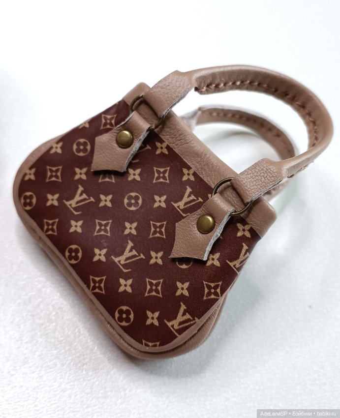 Ботинки и сумочка "Луи Виттон" для Паола Рейна (фото 4)