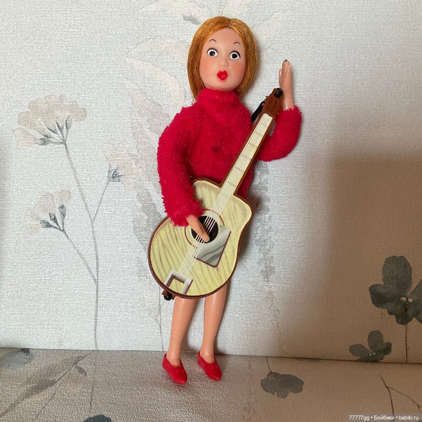 Гибкая гитаристка из прошлого (фото 2)