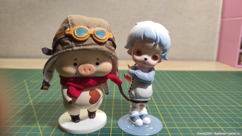 Пара фигурок лотом — Статуэтки