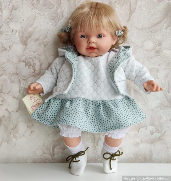 Carmen Gonzalez NILO, мягконабивная кукла НИЛО в бело-зеленом комплекте, 48 см