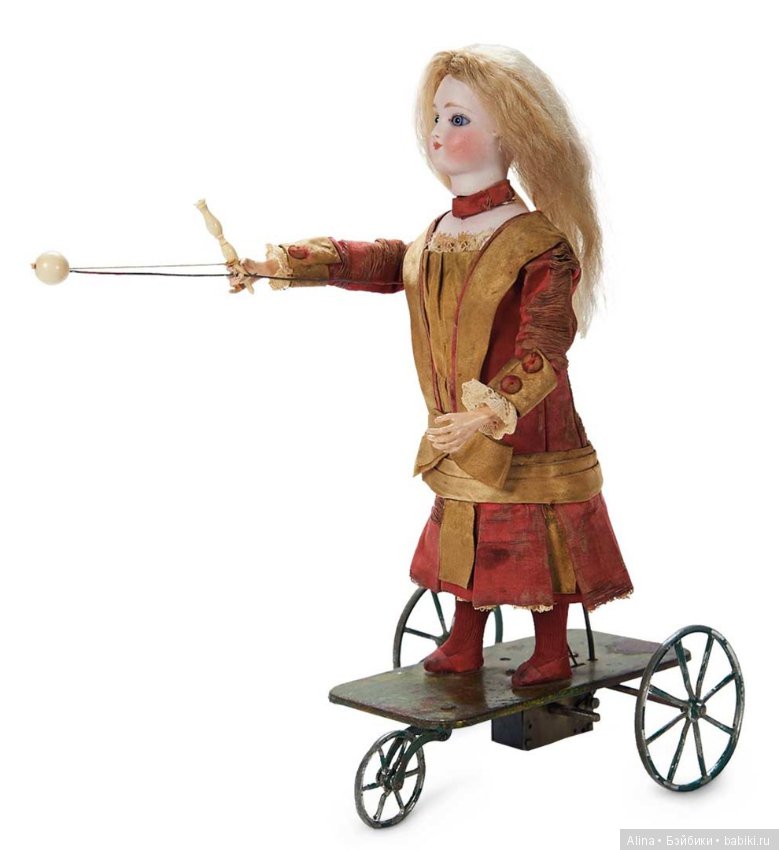 Механические антикварные игрушки, приходят в действие от вращения колёс (фото 2)