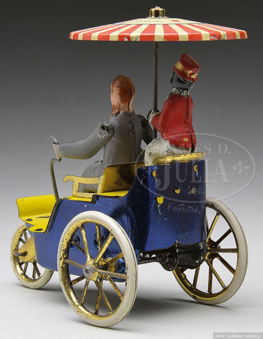 Механические антикварные игрушки, приходят в действие от вращения колёс (фото 8)