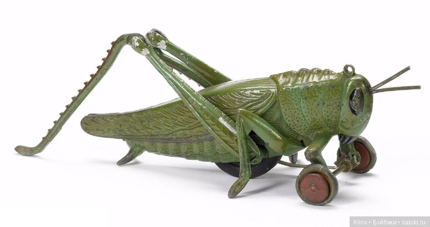Механические антикварные игрушки, приходят в действие от вращения колёс (фото 9)
