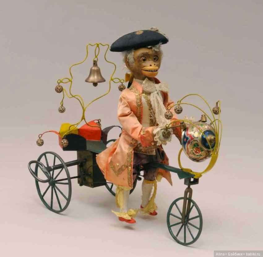 Механические антикварные игрушки, приходят в действие от вращения колёс (фото 6)