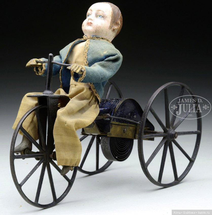 Механические антикварные игрушки, приходят в действие от вращения колёс