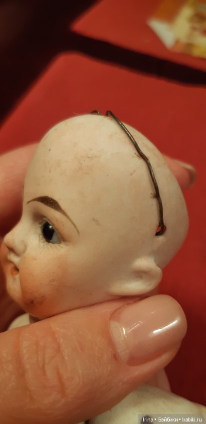 Подскажите, пожалуйста, как правильно установить голову кукле