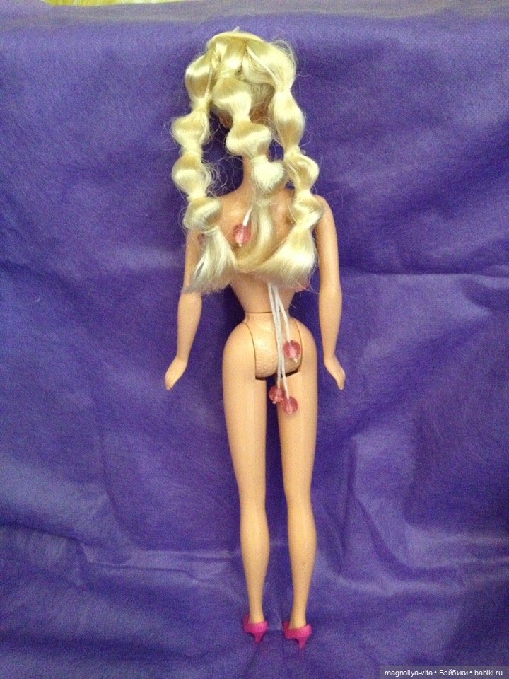 Необычная кукла Барби с эффектом скручивания волос