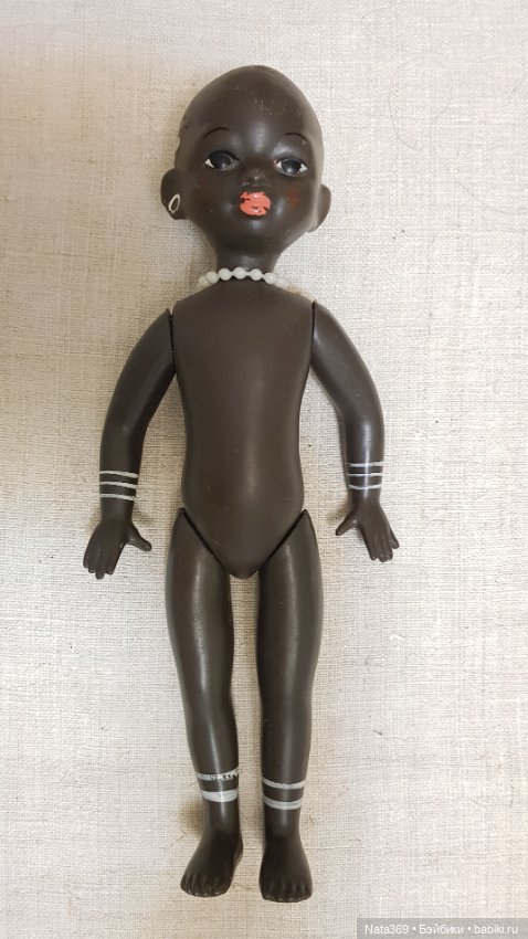 Как одеть куколку? Помогите