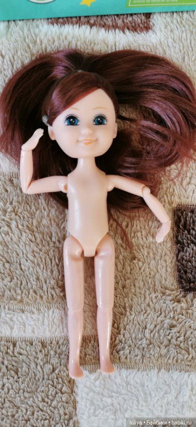 Игровушка с улыбкой ангелочка