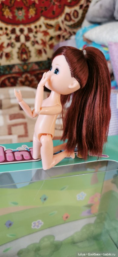 Игровушка с улыбкой ангелочка