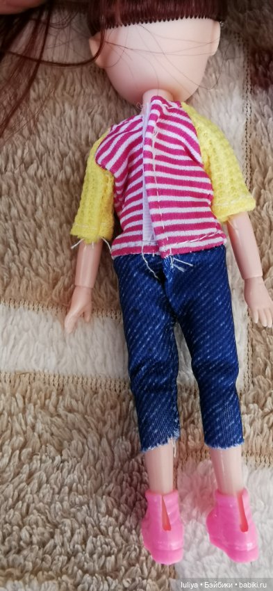 Игровушка с улыбкой ангелочка