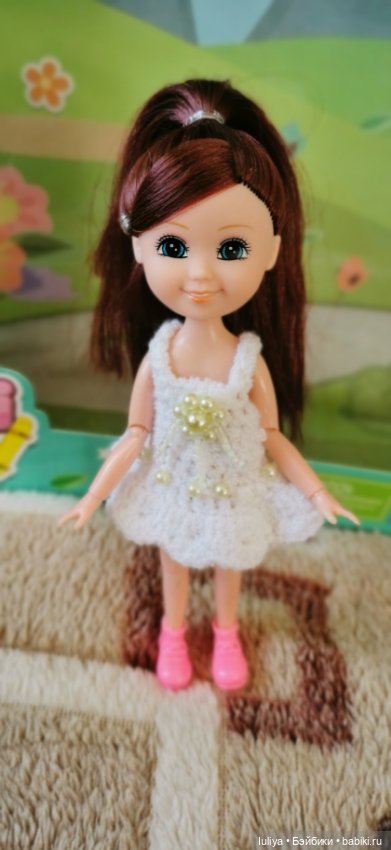 Игровушка с улыбкой ангелочка