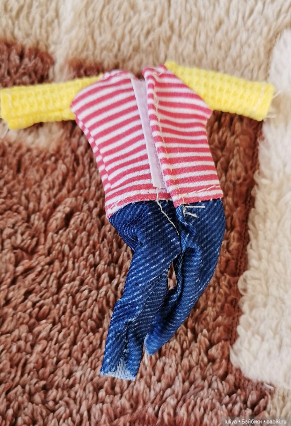 Игровушка с улыбкой ангелочка