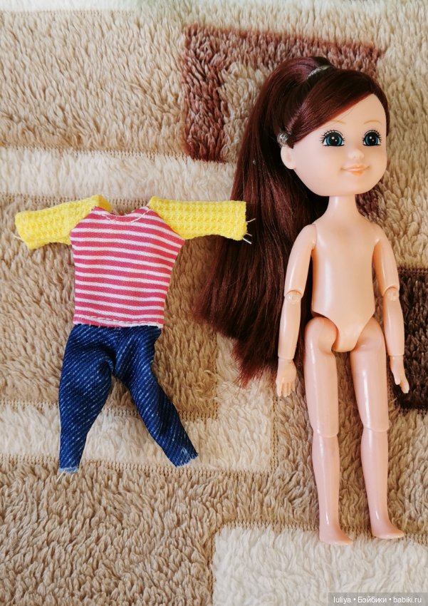 Игровушка с улыбкой ангелочка