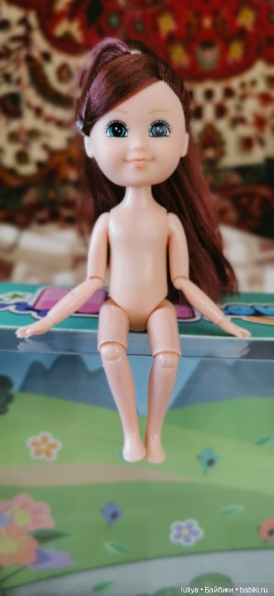 Игровушка с улыбкой ангелочка