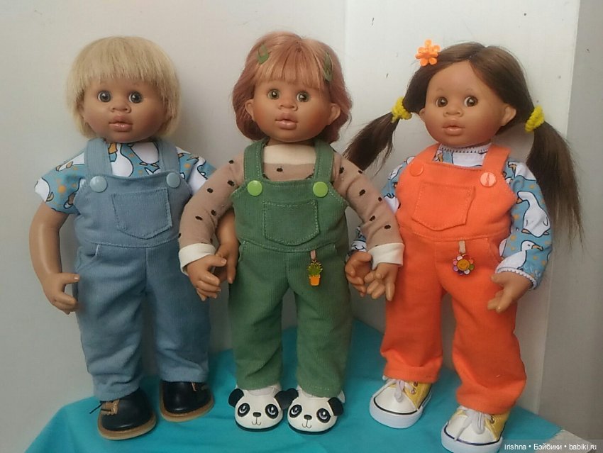 Смешные мордашки в ярких одежках (фото 5)