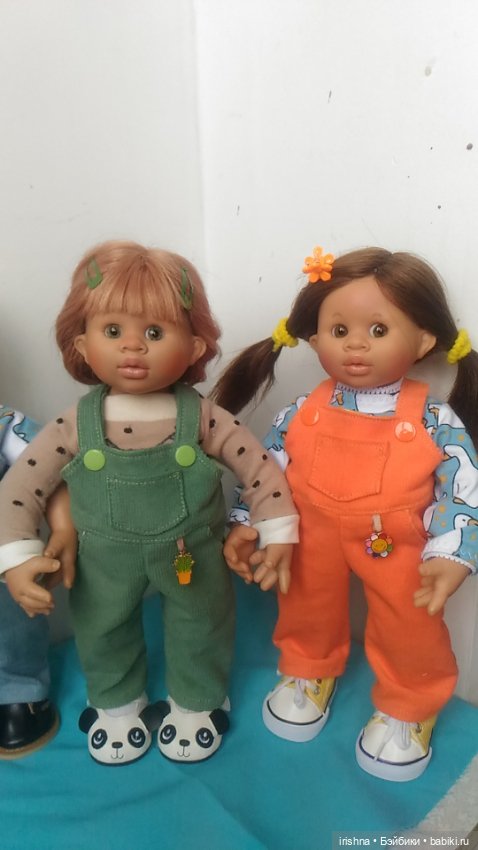 Смешные мордашки в ярких одежках (фото 4)