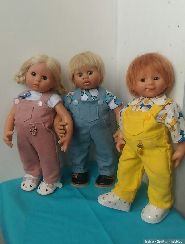 Смешные мордашки в ярких одежках (фото 10)