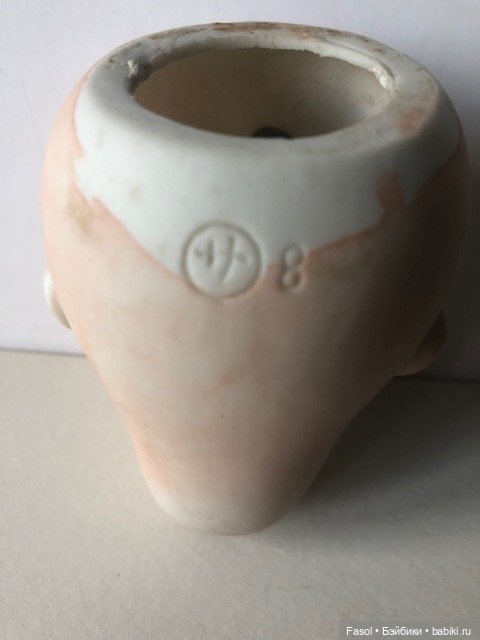 Кто производитель антикварного пупса