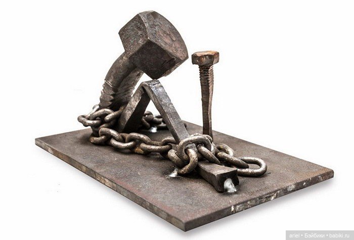 Очеловеченные скульптуры из стальных болтов (фото 3)