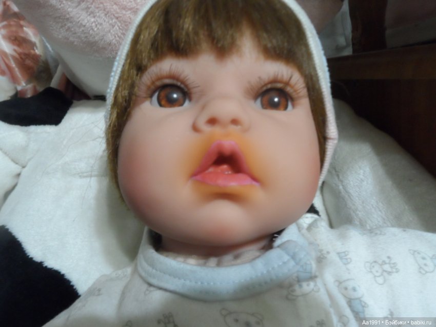 Как и чем можно вывести с силикона оранжевый ореол у ротика от акриловой краски (фото 2)