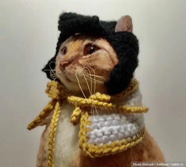 Художница своими руками делает шапочки для котеек